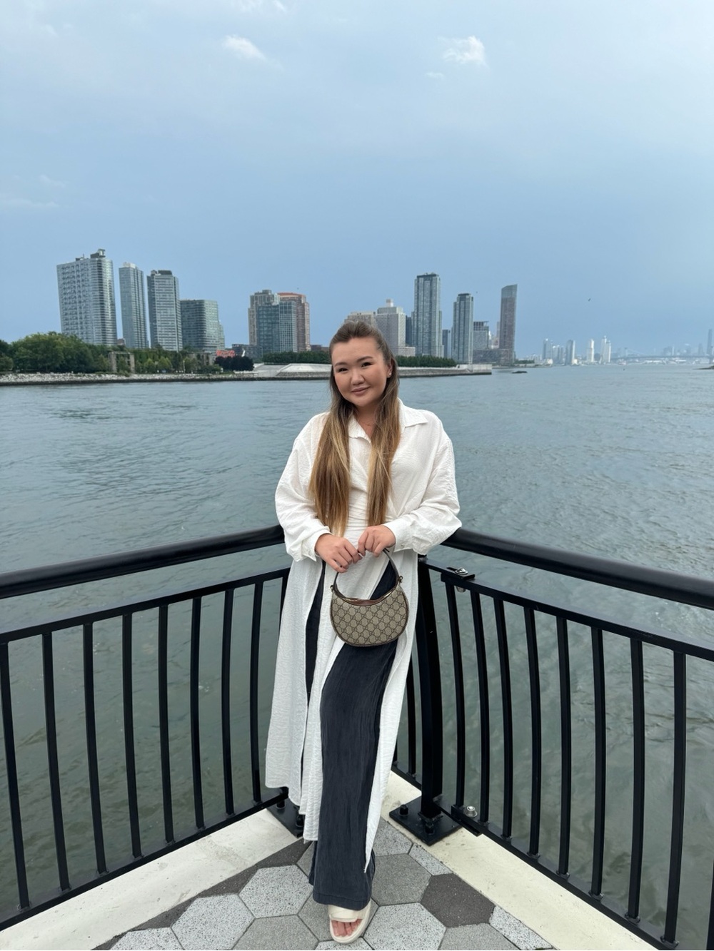 White Long Textured Duster Coat with Black Dress and Beige Monogram Crossbody